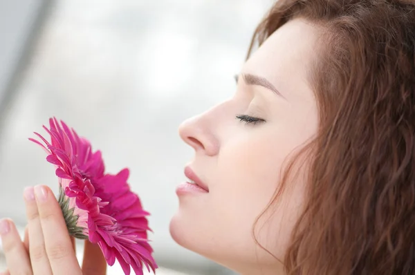 Happy woman with flower at dating Royalty Free Stock Photos