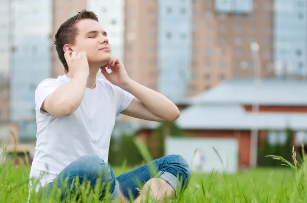 Young attractive man with headphones — Stock Photo, Image