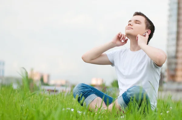 Young attractive man with headphones — Stock Photo, Image