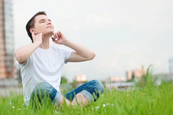 Young attractive man with headphones — Stock Photo, Image