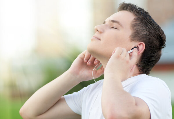 Young attractive man with headphones