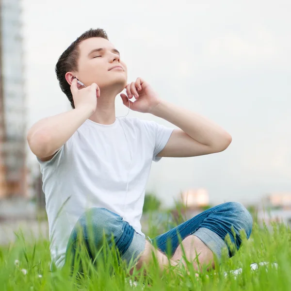 Young attractive man with headphones — Stock Photo, Image