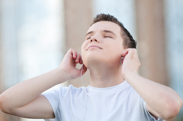 Young attractive man with headphones