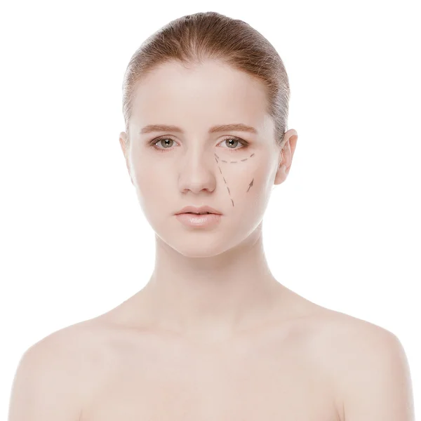 Beautician draw correction lines on woman face — Stock Photo, Image