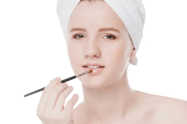 Schöne Frau mit Make-up Pinsel — Stockfoto