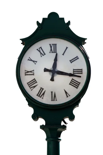 Старые часы изолированы на белом — стоковое фото
