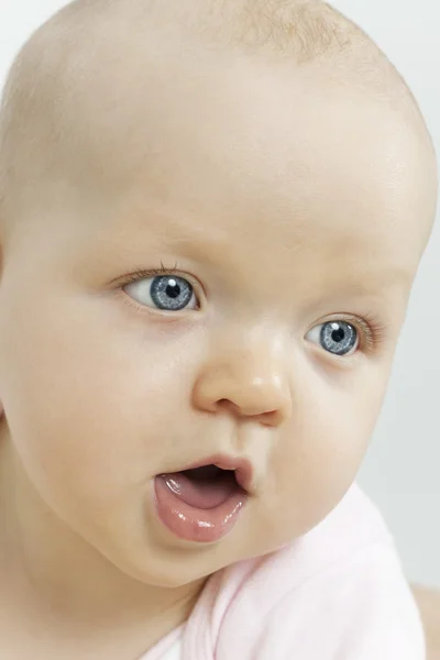 Closeup portrait of a beautiful baby girl — Stock Photo, Image