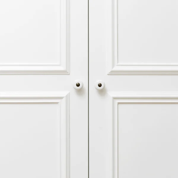 Plain white wooden doors — Stock Photo, Image