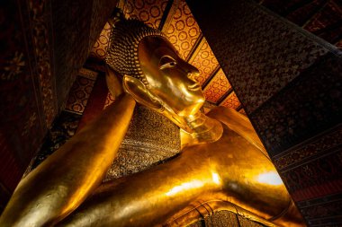 The Buddha statue is a symbol in Wat Pho public temple in Bangkok, Thailand.