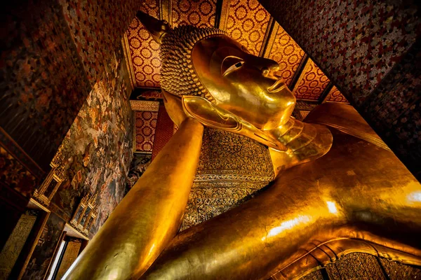 The Buddha statue is a symbol in Wat Pho public temple in Bangkok, Thailand.