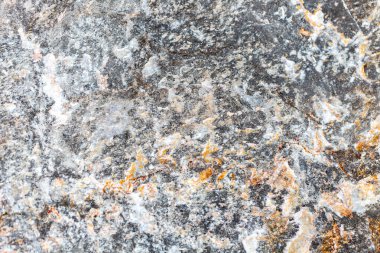 Arka planda çakıl taşları. Taş dokusuna yakın çekim