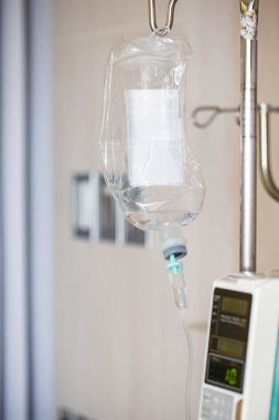 Saline bottle with saline hose