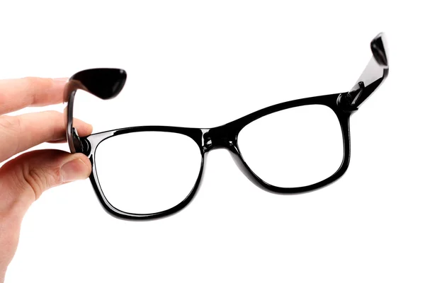 Hand with black glasses isolated on white — Stock Photo, Image