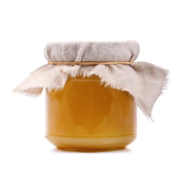 Jar of honey isolated on white — Stock Photo, Image