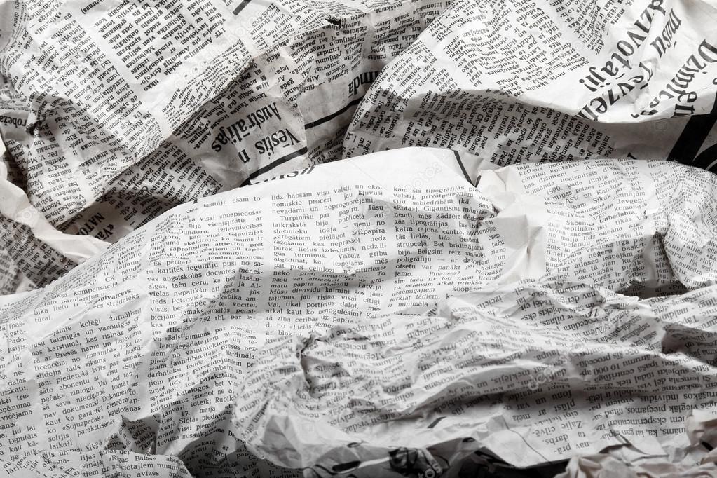 background of old crumpled newspapers