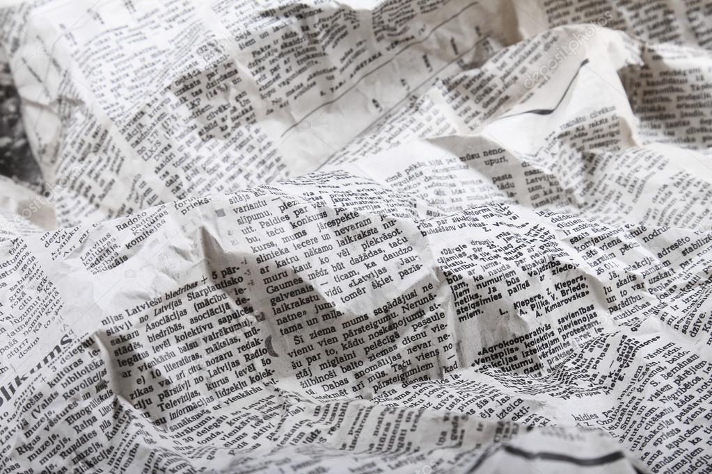 background of old crumpled newspaper