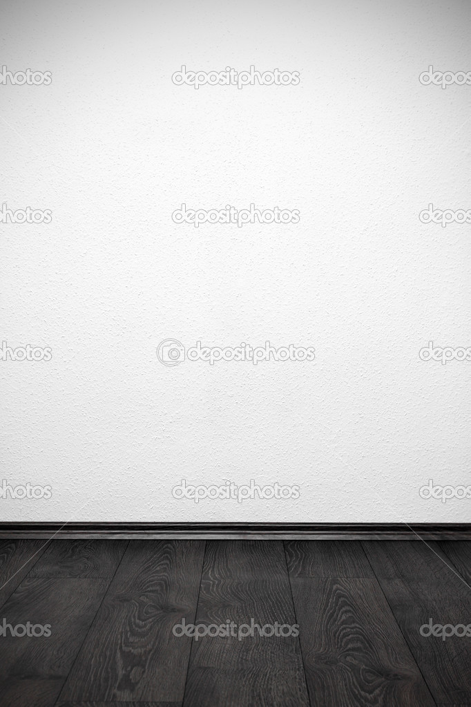 blank white wall and wooden floor