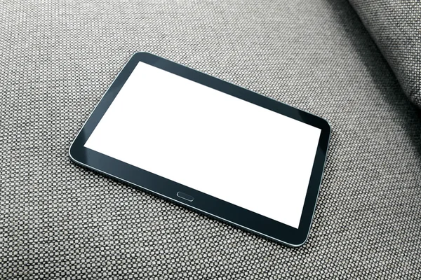 Leere digitale Tablets auf der Couch — Stockfoto