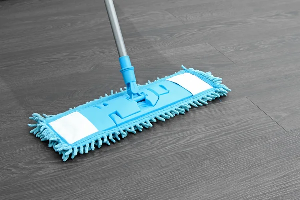 House cleaning - mop washing wooden floor — Stock Photo, Image