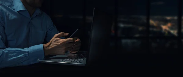 Man Working Dark Office Night Using Mobile Phone Laptop Copy — Stock fotografie