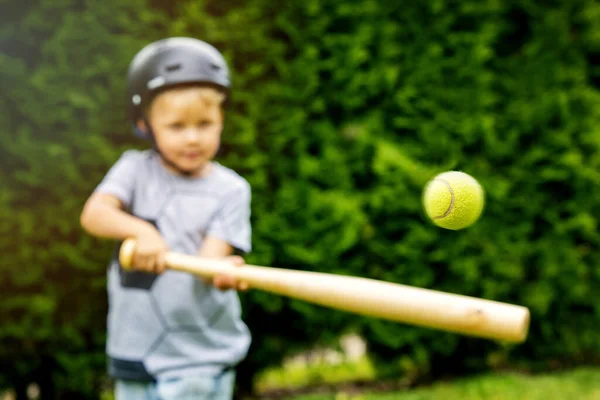 Little Boy Hitting Tennis Ball Baseball Bat Home Backyard — Stockfoto