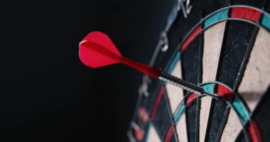throwing dart arrows in the dartboard. target marketing concept