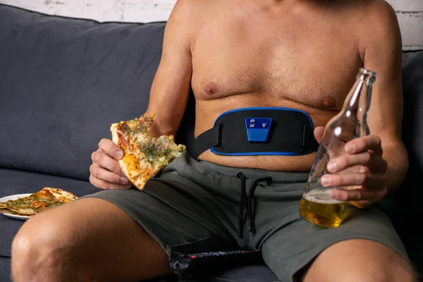 Man Sitting Couch Eat Pizza Drink Beer While Using Electronic — Foto de Stock