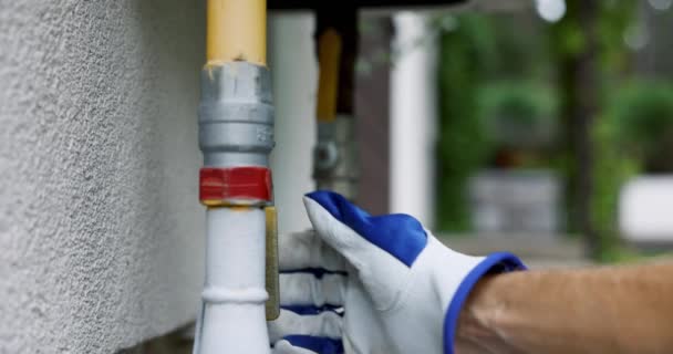 Hand Closes Household Gas Pipe Valve — стоковое видео