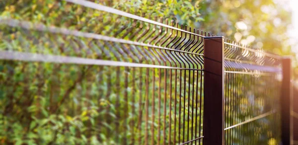 welded metal wire mesh panel fence. banner with copy space