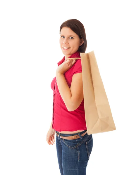 The young girl is carrying a shopping bag Stock Photo