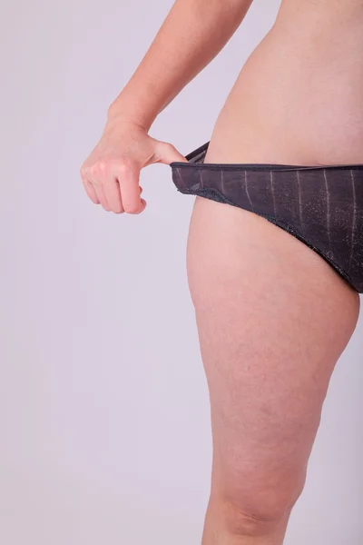 An woman is in her underwear in front of the camera — Stock Photo, Image