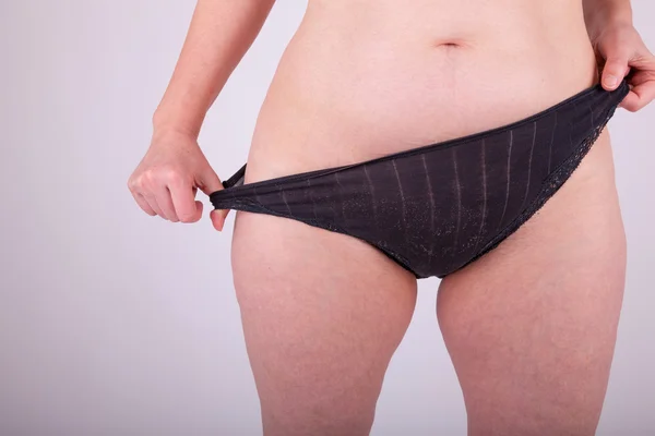 An woman is in her underwear in front of the camera — Stock Photo, Image