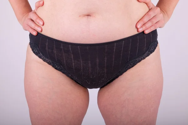 An woman is in her underwear in front of the camera — Stock Photo, Image