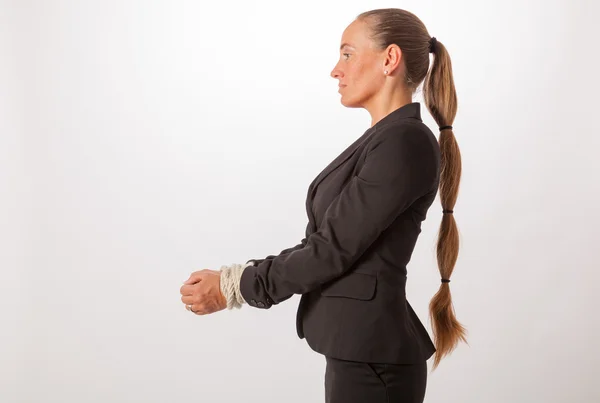 The hands of a young woman are handcuffed — Stock Photo, Image