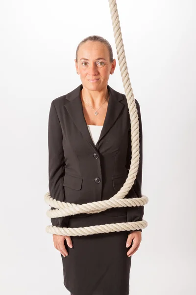 The young woman is tied with a rope — Stock Photo, Image