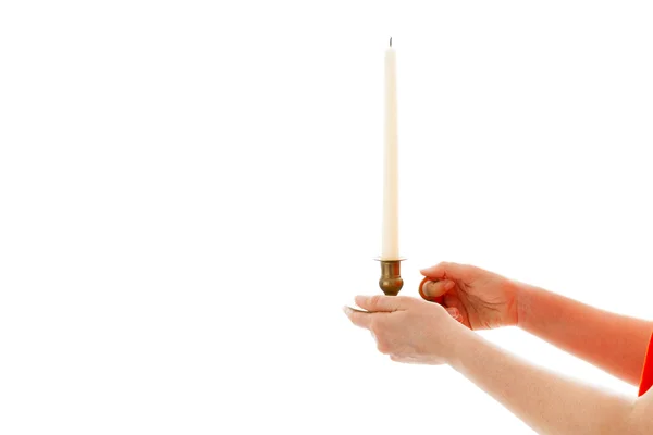 The young woman holds a candle in hands — Stock Photo, Image