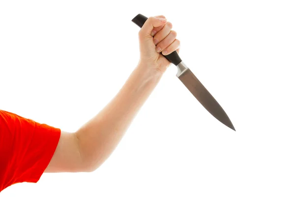 Die junge Frau hält ein Messer in der Hand — Stockfoto