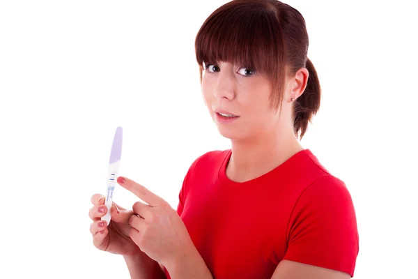 The young woman with a pregnancy test — Stock Photo, Image