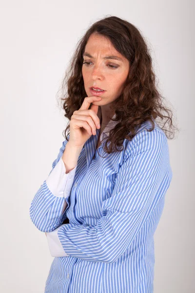 The young business woman standing in front of the camera — Stock Photo, Image