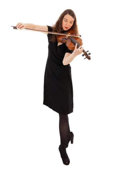 Красивая молодая женщина играет на скрипке — стоковое фото
