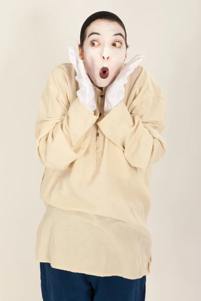 The clown is standing in front of a camera and making a face — Stock Photo, Image