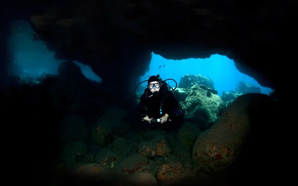 Diver in a Lava Tube in Kona Hawaii — Stock Photo, Image