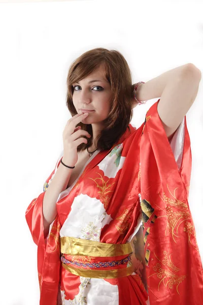 French young girl geisha in red silk kimono — Stock Photo, Image