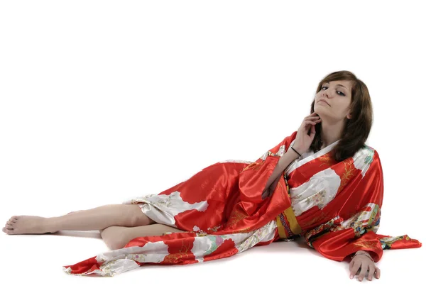 Franska ung flicka geisha i rött siden kimono — Stockfoto