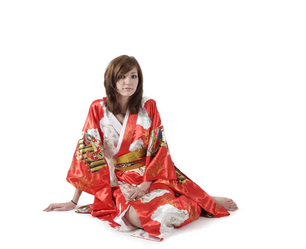 French young girl geisha in red silk kimono — Stock Photo, Image