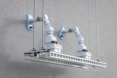 3D otomasyon robotik kollar binanın dışındaki duvarı temizliyor