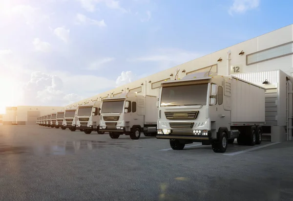 3d rendering group of logistic trailer trucks or lorries at warehouse