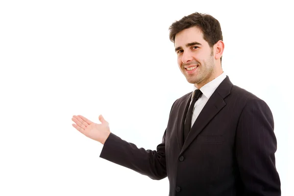 Hombre de negocios presentando sobre un fondo blanco — Foto de Stock