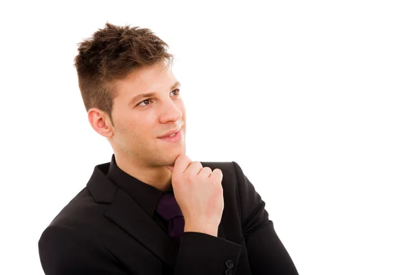 Closeup of a handsome young business man thinking, isolated on w — Stock Photo, Image