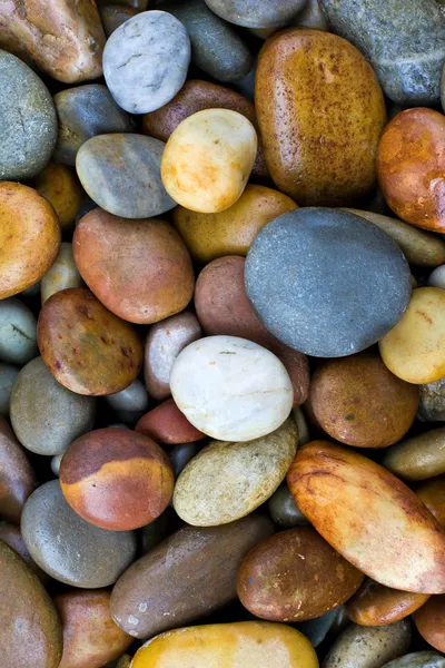 Yuvarlak işlenebilir taşlarla soyut arkaplan — Stok fotoğraf